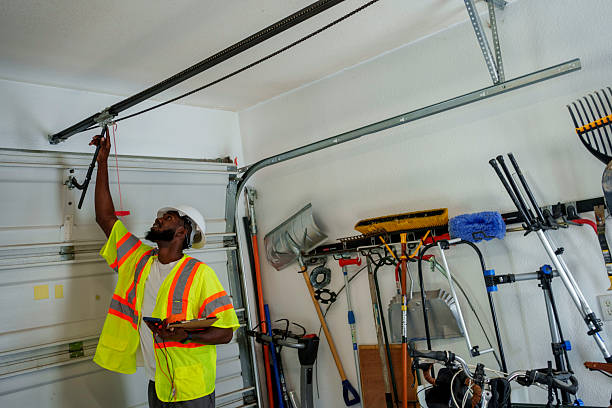 Professional Garage Door Panel Replacement technician working in Garfield, TX